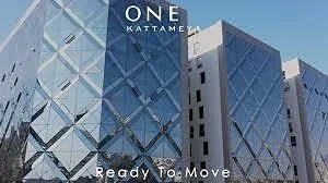 One Katamya — faceted glass curtain-wall elevation